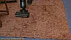 Wischsaugers auf einem dicken Teppich - Klappt nur suboptimal